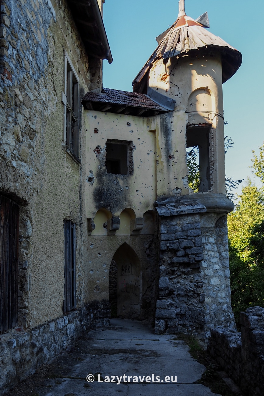 The shot-up walls are the result of battles that took place in the castle during the war in former Yugoslavia