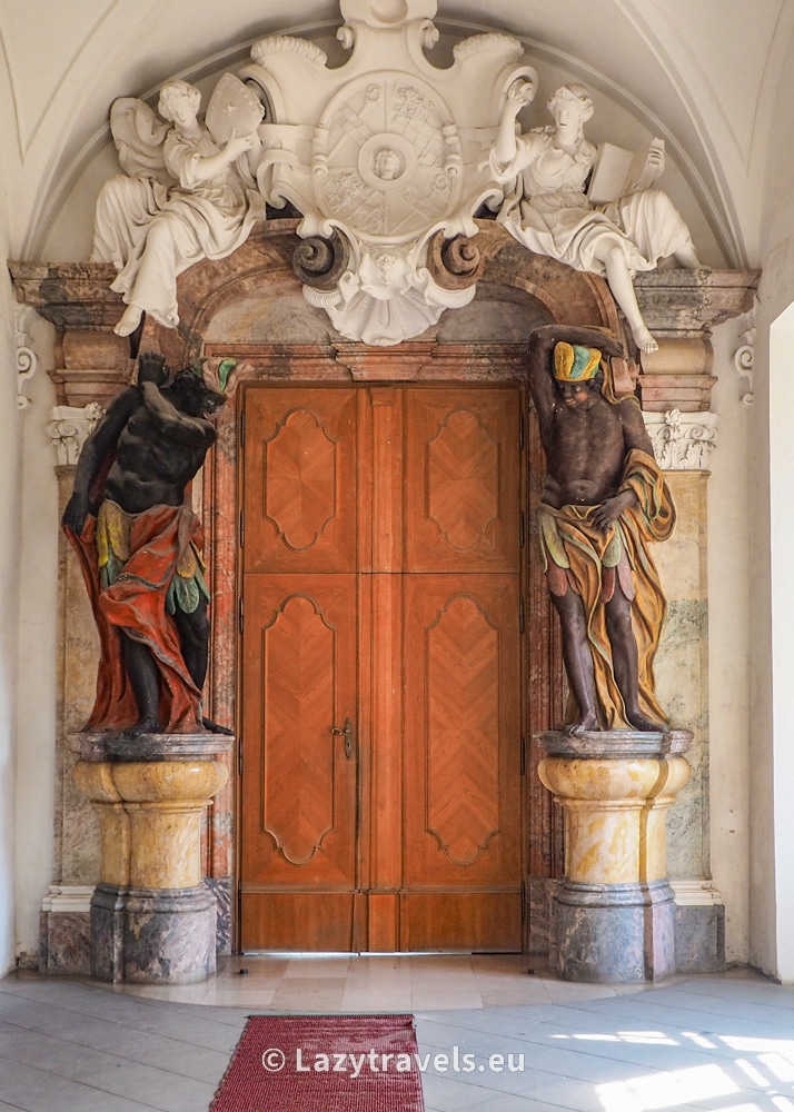 The door to the Prince's Hall in the Cistercian monastery in Lubiąż is guarded by a Negro and an Indian