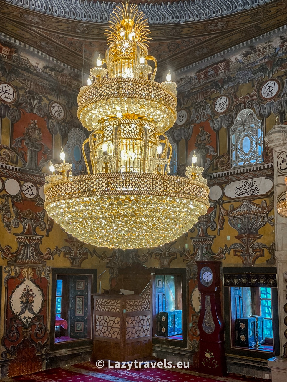 A chandelier in a mosque. Admit it, it looks like the furnishings of a rich palace.