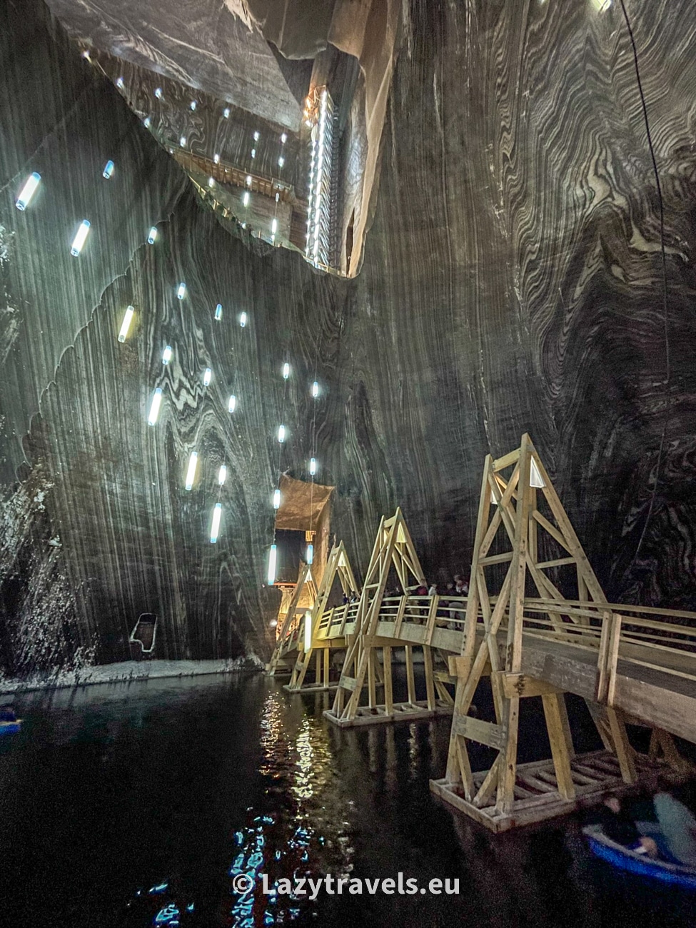 Wooden bridge in the Terezia shaft and mine. The lowest part of the Turda salt mine in Romania