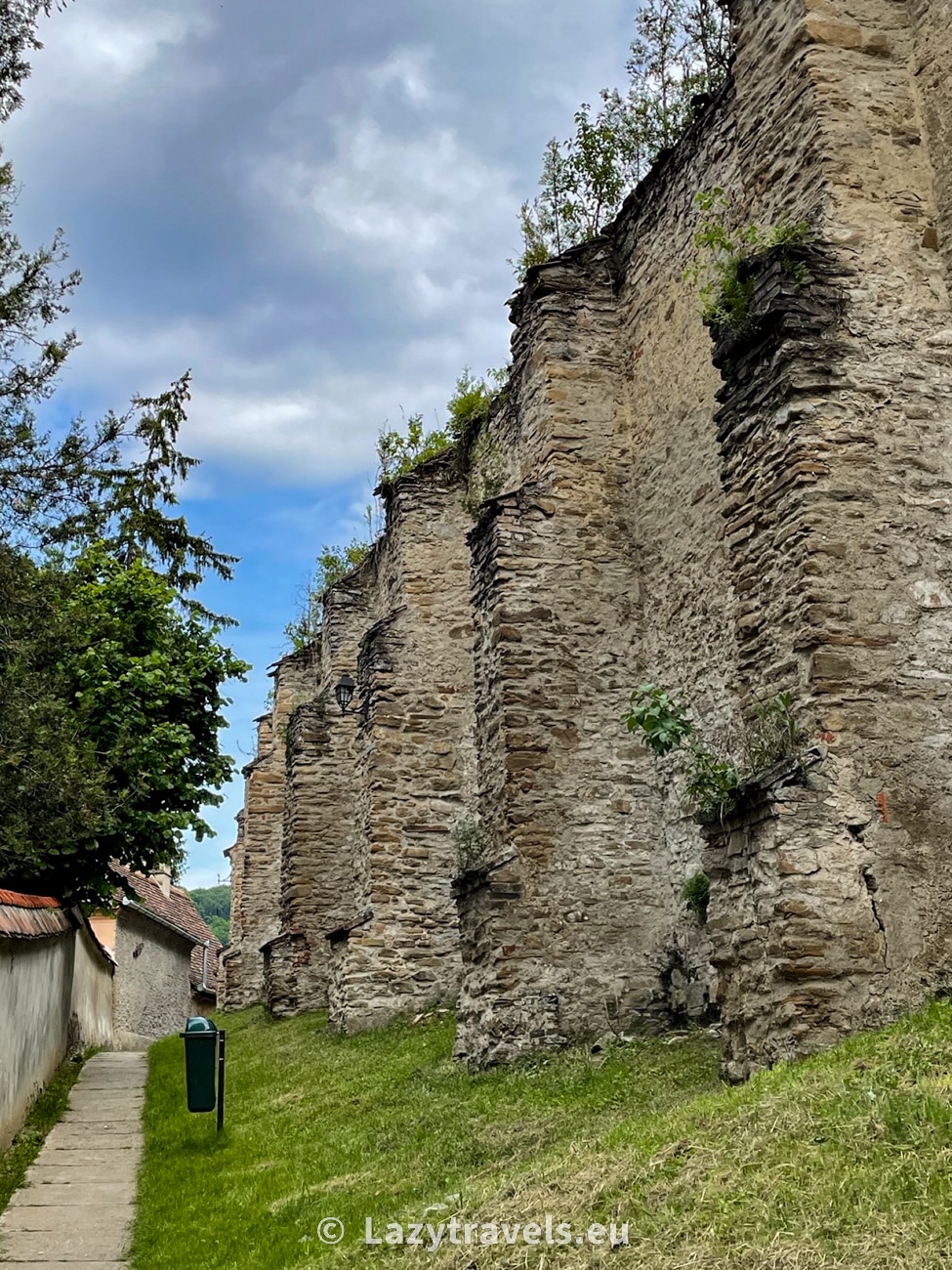 Path along the lowest level of fortifications of the fortified church in Biertan