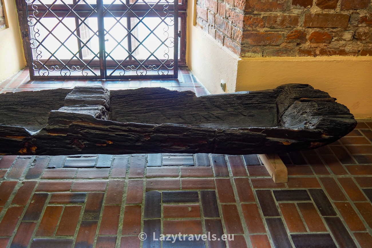 Wooden artifacts dating back to the Teutonic Knights era. The photo shows a fragment of a wooden boat.